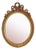 Wood and Gilded Plaster Noeud Damour Oval Mirror For Sale