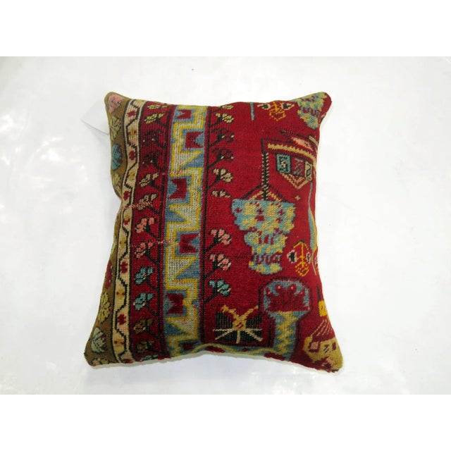 Pillow made from a 19th-century antique rug with cotton back. Zipper closure and foam insert provided. 16'' x 18''