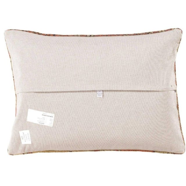 Vintage hand woven Turkish pillow. This is made of wool. Back cotton. Beautiful colors and well made. This pillow features...