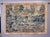 Woven late 17th century Flemish tapestry depicting a wooded landscape with hunting figures and animals in the foreground,...