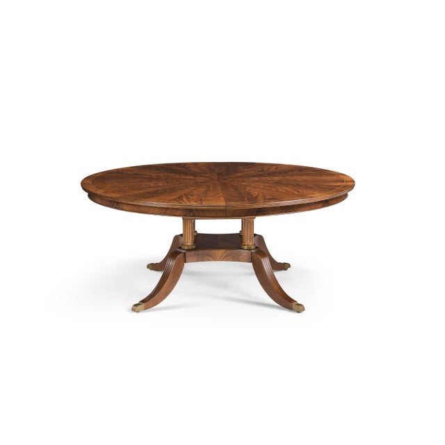 72"-100" Round-to-oval mahogany dining room table. This pedestal table has a 28" self-storing butterfly leaf, and it...