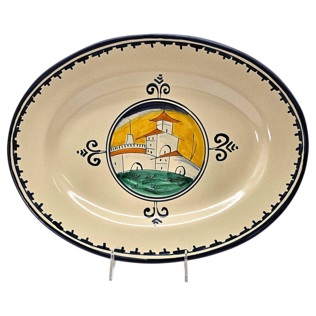 A vintage Italian maiolica serving platter in the “Casolare” pattern by Corso dei Fiori, produced circa 1980s–1990s. The...