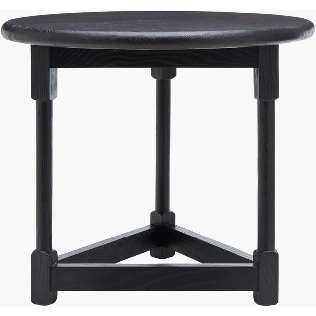 Elevate your living space with the charming Leandro End Table, a perfect blend of rustic elegance and practical design....