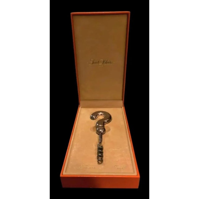 This is a rare French corkscrew by Saint Hilaire Paris. The handle is designed in the shape of a question mark. The...