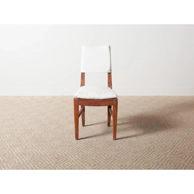 Outdoor teak dining chair with back slipcover and seat cushion. 100% solution dyed acrylic.