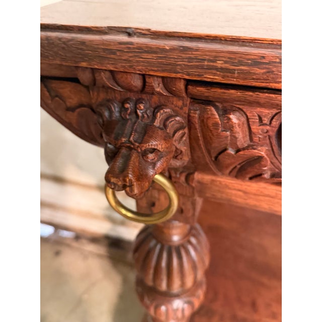 Antique oak French server, circa 1860's . The piece features a rectangular top with detailed palmette apron and four...