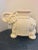 Gorgeous ivory tone glazed elephant accent table. Large in size, great for a cocktail table, garden table or plant stand....