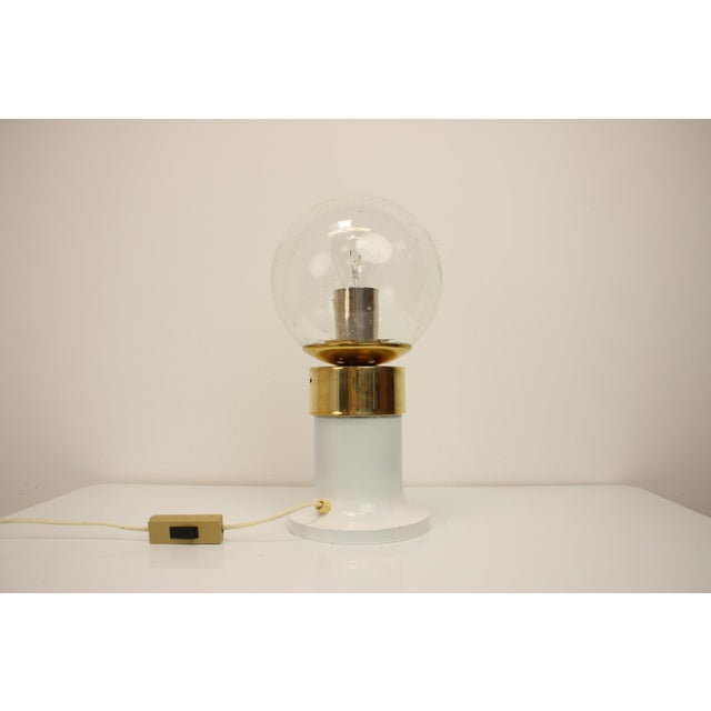 Vintage brass and glass table lamp, produced by famous Kamenicky Senov Glassworks in former Czechoslovakia in the 1960's....