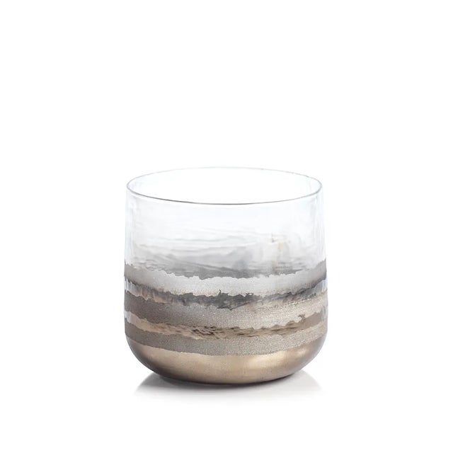 This hurricane candle holder set will provide a tasteful ambiance to any room in your home. An elegant smoky glass covers...