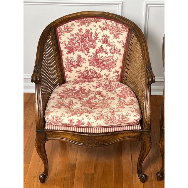 French Provincial Pair French Louis XV Style Walnut and Cane Barrel Back Bergere Chairs in Toile, 20th C. For Sale - Image 3 of 13
