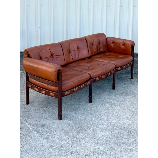 Offered is an exceptional and increasingly rare individual 3-seater sofa, Attributed to Arne Norell for Coja, Sweden. This...