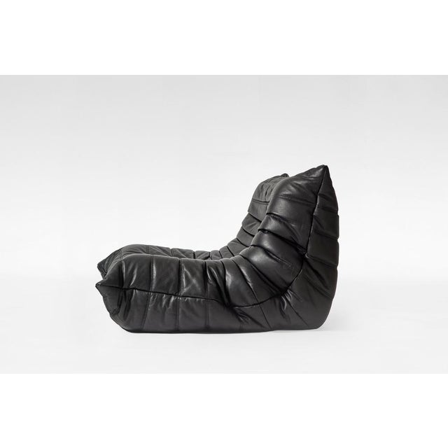 A vintage Togo Lounge Chair by Michel Ducaroy for Ligne Roset, designed in France in 1973. This iconic all-foam lounge...