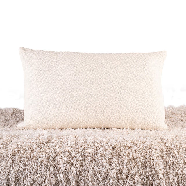 DESCRIPTION Creamy white woven chevron pillow in alpaca. Shipped with luxury duck down insert. Available without insert....