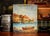 This charming antique oil painting on canvas, dating back to circa 1900, captures a serene coastal village scene that...