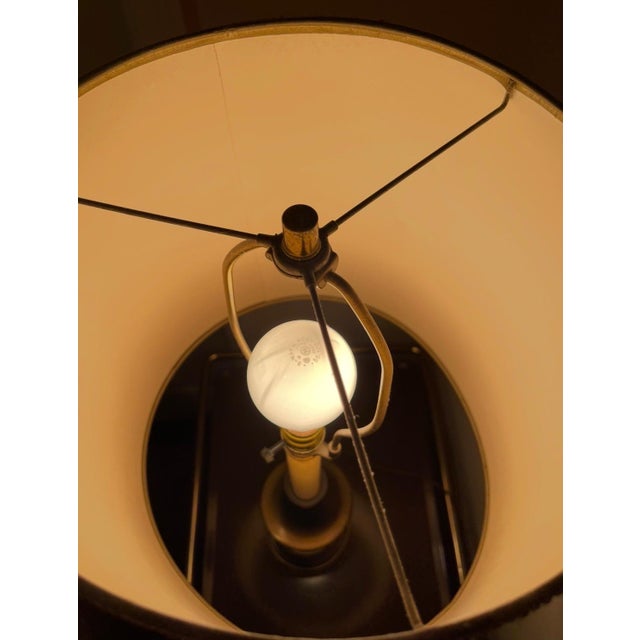 Elevate your interior styling with this striking mid-century modern torchiere table lamp from the revered Rembrandt...