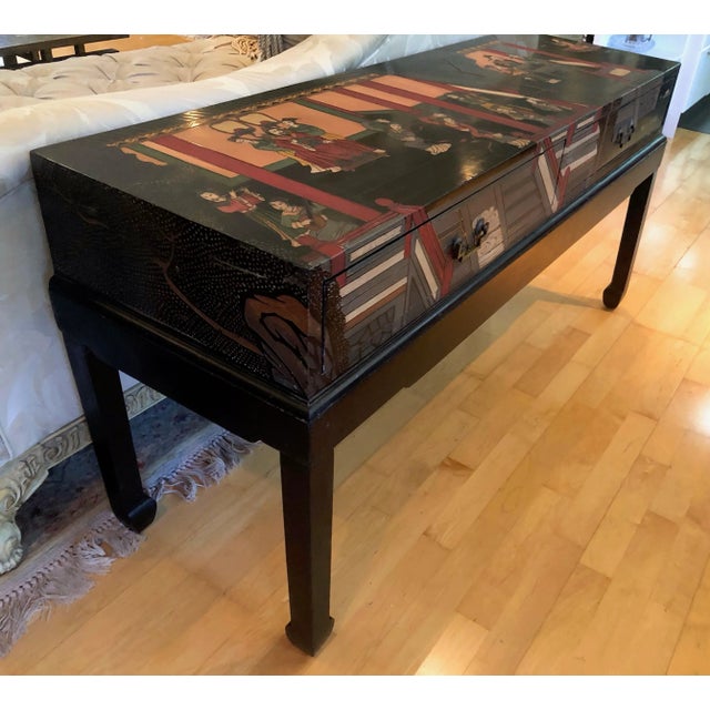 Chinese export lacquered console sofa table. Raised coromandel waterfall style. Beautifully hand-crafted in an Asian...