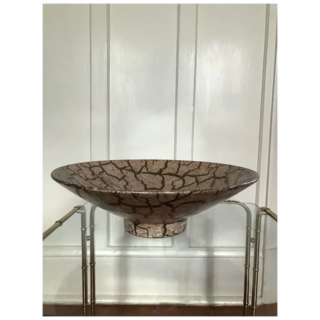 This stunning pedestal bowl by Haeger is a perfect embodiment of Mid-Century Modern pottery. Featuring a wide, angular...