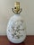 Beautiful off-white glazed studio pottery table lamp with botanical motif. Bottom is signed Hatch. Please see condition...
