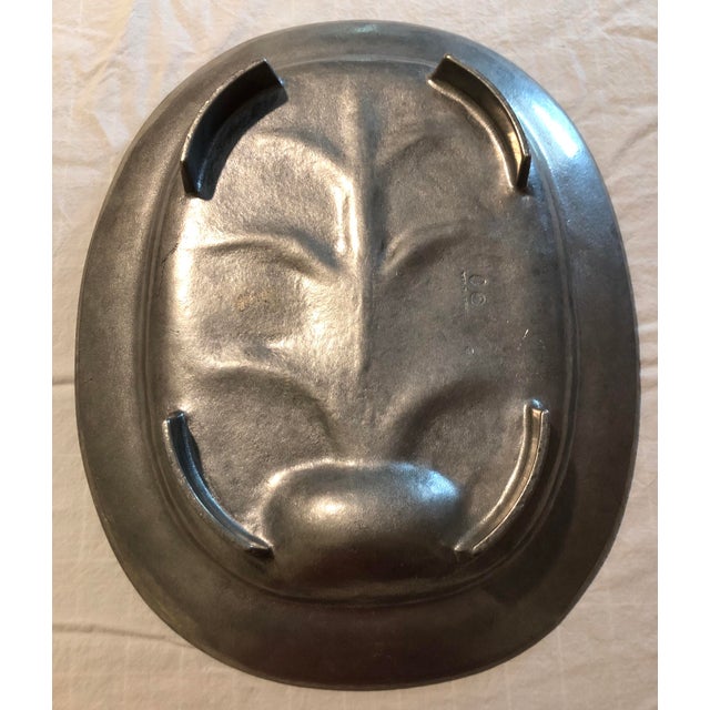 Decorative Pewter Platter with grooves for juices. Beautiful for use or display.