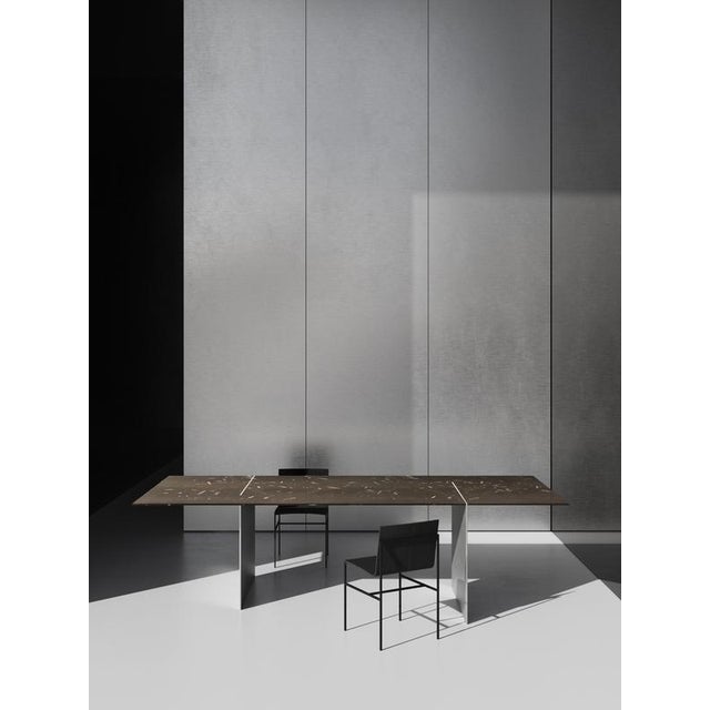 Hera dining table in jurassic fossil stone by nerinea. Dimensions: w 280 x d 120 x h 72 cm. Materials: natural stone...