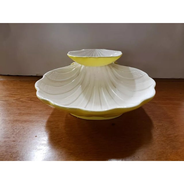 This is a 1976 Mann Ceramic Shell Shaped 2 Tier Chip & Dip Bowl, Made in Japan. It measures 4 1/4" high and 11“ deep x 10...
