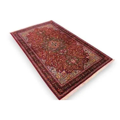 Rug Sarouk | Knot density: High | Material: Exquisite wool | Size: 202×133 cm | Pattern: Colorful leaf and flower motifs |...