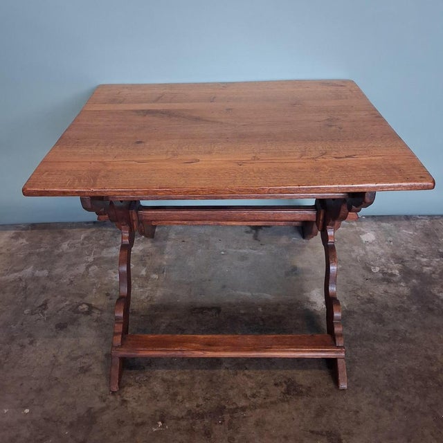 This antique farm table dates from the 18th century and is crafted from solid oak. Designed as a functional everyday...