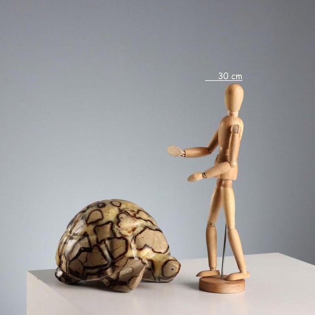 Septarian stone sculpture depicting a turtle. Made in Europe. This piece is attributed to the mentioned designer/maker. It...