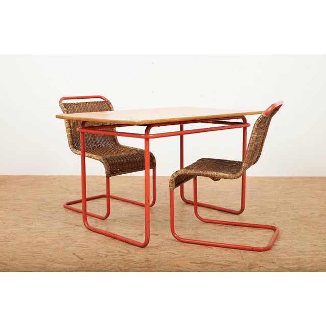Table with Chairs in Red Lacquered Tubular Steel by S. Meier for Rohrmöbelfabrik, 1920s, Set of 3, in Worn conditions....