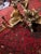 A striking and highly decorative pair of original early Louis XV gilt-bronze ormolu chenets, or fire dogs, dating to circa...