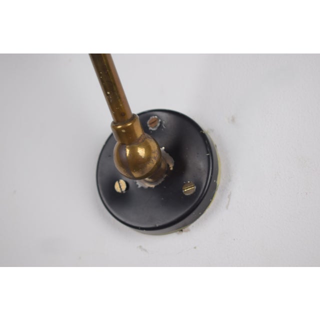 An adjustable spotlight produced by Stilux in the 1960s, an elegant example of mid-century Italian lighting design....