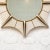 The "Star Mirror" by R&Y Augousti is a resplendent showcase of artisanal craftsmanship, exuding the spirit of Art Deco...
