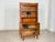 For sale is a stylish vintage display cabinet, an original from the 1960s. It impresses with its beautiful pearwood...