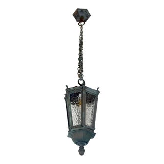 Antique Traditional Bronze Wavy Glass Pendant Light For Sale
