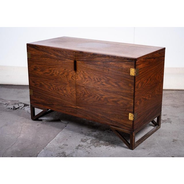 Elegant Danish Mid-Century Modern cabinet designed by Svend Langkilde and produced by Langkilde Møbler for Illums...