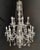An exquisite vintage Hollywood Regency style French crystal chandelier. Crafted with meticulous attention to detail, this...