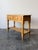 Crafted from warm, antique English pine, this 19th-century side table adds a charming touch to any empty corner. It...