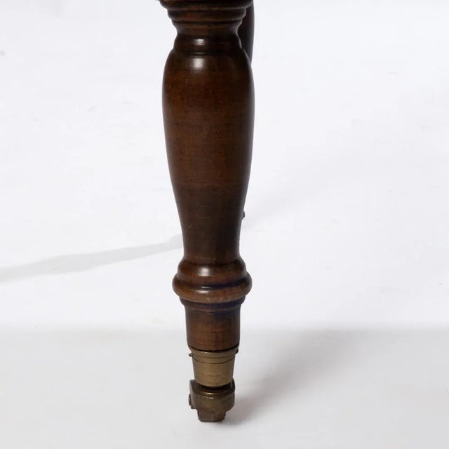 This Vintage Brandt Cherry Book Stand was made in Hagerstown, MD. It features a slant top surface and storage for books...