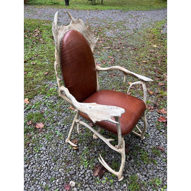 A vintage Arthur Court Faux Antler and brown leather arm chair, probably dating for the 70's-80's and I believe, no longer...