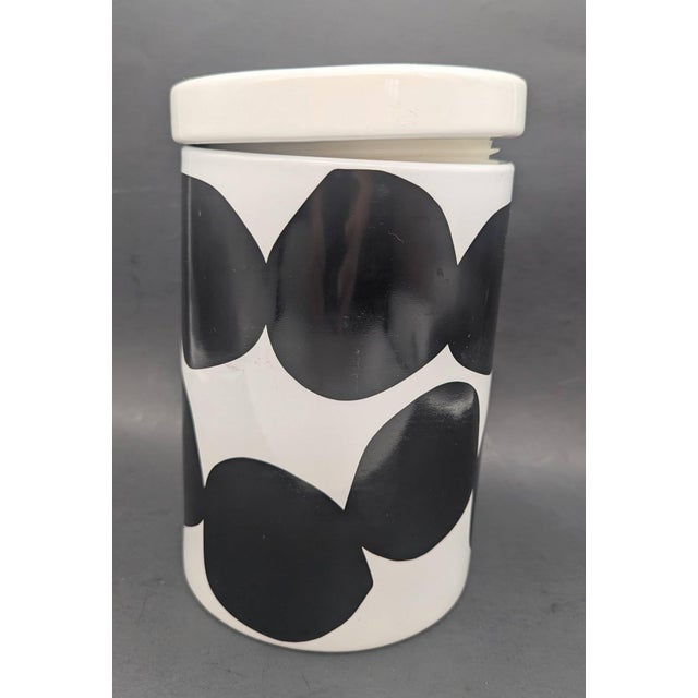 Offered is a Crate & Barrel brand Marimekko-designed "Räsymatto" pattern kitchen canister released in 2011. The Räsymatto...