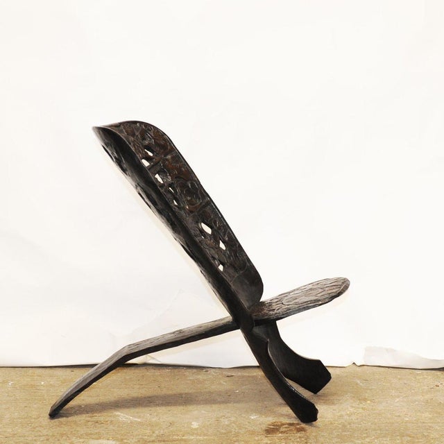 A piece of African heritage, a hand-carved Palaver chair. Traditionally used by tribal elders and chiefs for storytelling...