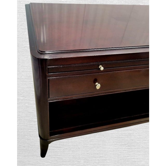 A wonderful oversized nightstand commode by Barbara Barry for Baker. The nightstand is very large with a handsome sleek...