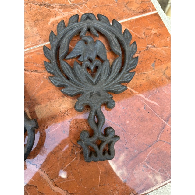 Up for consideration is a beautiful pair of cast iron trivets. These would look lovely in your home and they are a great...