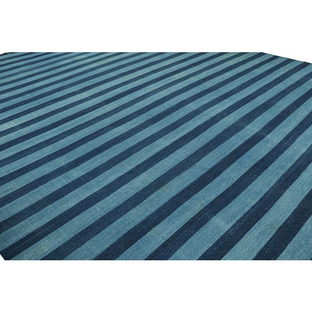 This contemporary Dhurrie flat weave is an exciting new entry in Rug & Kilim's esteemed custom-capable collection....