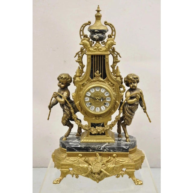 Vintage French Louis XV Style Brevettato Italy Brass & Marble Figural Clock Set - 3 Pc Set. Item features ornate figural...