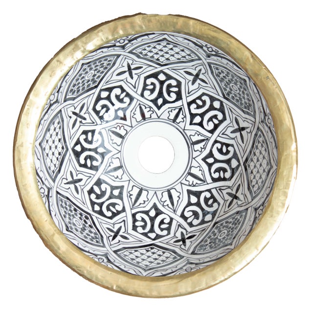 Round ceramic sink featuring Black and white design and a flat brass rim. We offer additional custom sizes for this sink,...