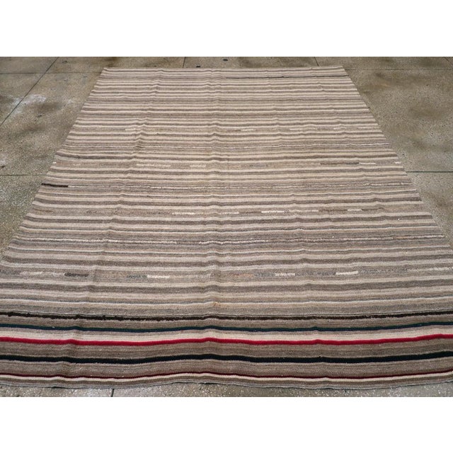 A vintage Turkish flatweave Kilim room size carpet handmade during the mid-20th century. Measures: 8' 3" x 10' 8"