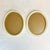 This pair of vintage painted wood framed oval picture frames are from Germany from the 1950s. Each has a glass insert and...