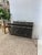 A sculptural and functional accent from the mid-20th century, this vintage magazine rack features a striking atomic-era...