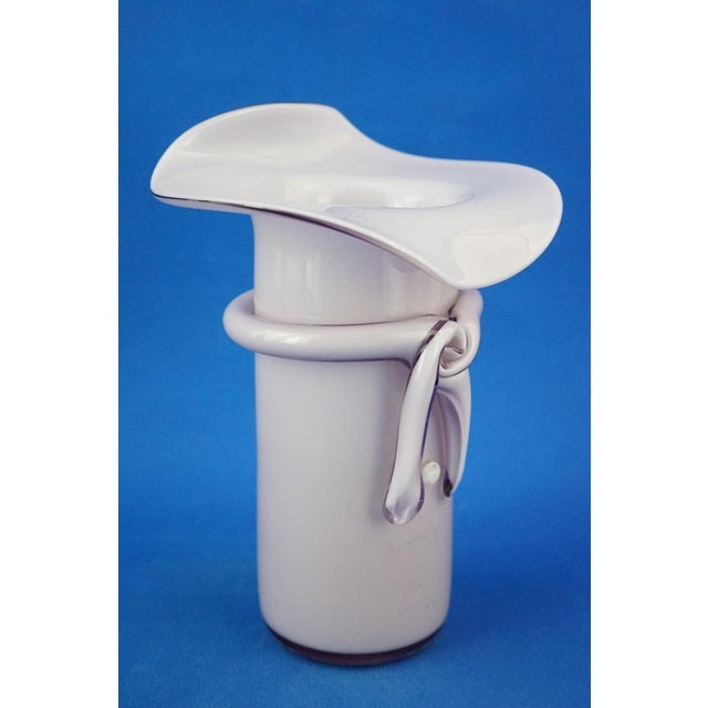 Beautiful hat-shaped vase, with a cylindrical body and a mouth shaped like the brim of a tuba (hence the name "hat"),...